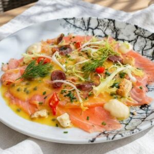 Carpaccio de saumon confit, vinaigrette passion